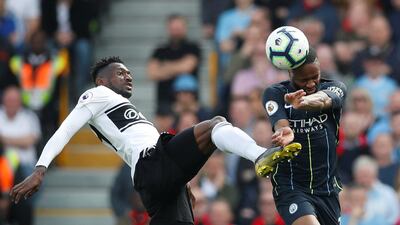 Fulham's Andre-Frank Zambo Anguissa in action with Manchester City's Raheem Sterling. Reuters