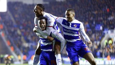 Nathaniel Chalobah, Michael Hector and Jordan Obita celebrate Reading's third goal against Bradford. Eddie Keogh / Reuters