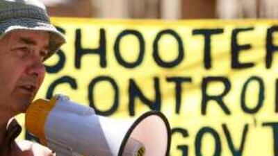 Colong Foundation for Wilderness spokesman Keith Muir joins a protest opposed to allowing hunters into National Parks.