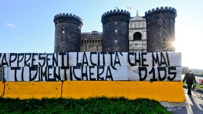 A banner reading 'You represent the city that will never forget you' has been placed in front of the Maschio Angioino castle to pay tribute to Diego Maradona. EPA