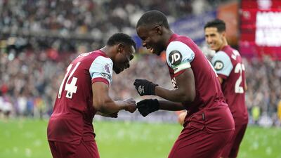 West Ham United's Mohammed Kudus (left) celebrates scoring their side's first goal of the game during the Premier League match at the London Stadium, London. Picture date: Sunday December 17, 2023. PA Photo. See PA story SOCCER West Ham. Photo credit should read: Mike Egerton/PA Wire RESTRICTIONS: EDITORIAL USE ONLY No use with unauthorised audio, video, data, fixture lists, club/league logos or "live" services. Online in-match use limited to 120 images, no video emulation. No use in betting, games or single club/league/player publications.