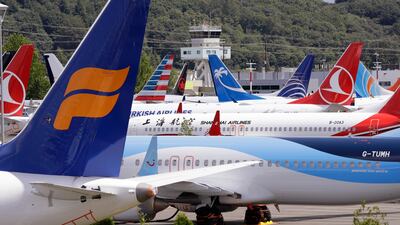 Dozens of grounded Boeing 737 MAX aircraft crowd a parking area adjacent to Boeing Field in Seattle. AP