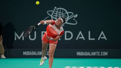 Ons Jabeur serves to Emma Raducanu during their match at the Mubadala World Tennis Championship in Abu Dhabi. AP