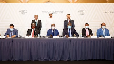Officials from Chad, Ethiopia, South Sudan, Angola, Sudan, the Democratic Republic of the Congo and Cameroon sign the declaration to fight and eradicate Guinea worm disease in the UAE capital on Wednesday.