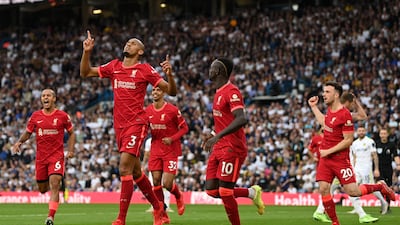 Fabinho celebrates after scoring for Liverpool. Getty