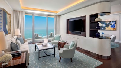 Rooms overlook the private beach and Arabian Gulf.