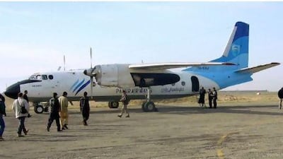 A Pamir Airways Antonov AN-24 waits for passengers at the airport of Kunduz, Afghanistan. Can Merey / EPA