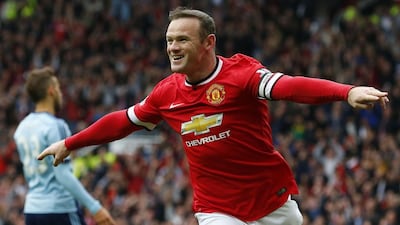 Wayne Rooney believes a top four finish can act as a springboard to silverware next season. Lindsey Parnaby / AFP