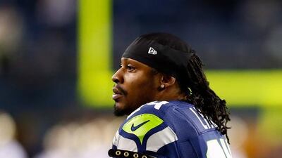 Running back Marshawn Lynch of the Seattle Seahawks looks on before a game against the New Orleans Saints at CenturyLink Field on December 2, 2013, in Seattle, Washington. Jonathan Ferrey / Getty Images