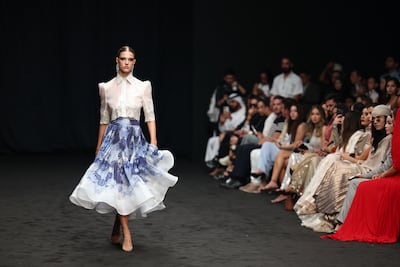 A look by Malaysian label Rizman Ruzaini on day one of Dubai Fashion Week spring/summer 2025. Chris Whiteoak / The National