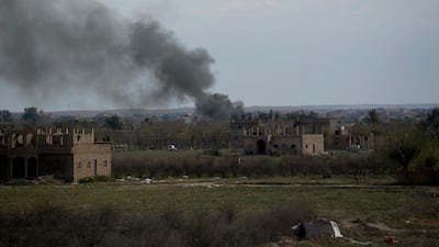 Smoke rises from a strike on Baghouz, Syria, on Friday. AP