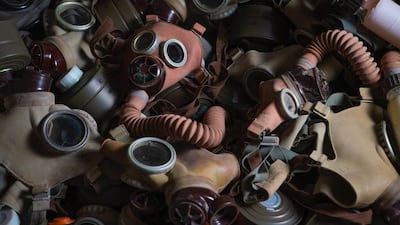 Gas masks distributed to Saudi citizens during the first Gulf War, now part of an art installation at Riyadh's Red Palace. Image courtesy of Athr and the artist