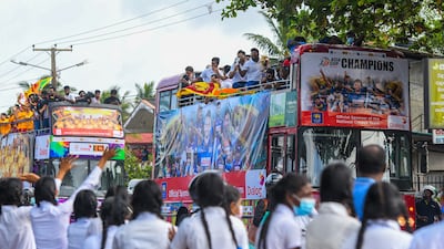 Kids welcome the victorious Sri Lankan team in Colombo. AFP