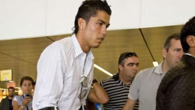 Cristiano Ronaldo leaves Amsterdam's Schiphol Airport after his ankle operation on Tuesday.