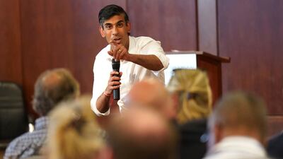 Rishi Sunak talks during a visit to St John's Wood Synagogue on Wednesday. AP