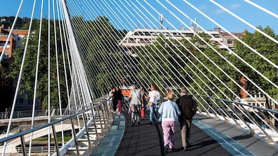 The pedestrian footbridge Zubizuri, created by Santiago Calatrava to resemble a sail, in Bilbao.