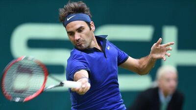 Roger Federer from Switzerland in action against Jan-Lennard Struff from Germany during the ATP Tournament in Halle, on June 16, 2016. AFP / CARMEN JASPERSEN