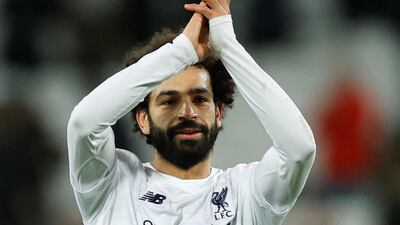 Liverpool's Mohamed Salah applauds fans after the match. Reuters/John Sibley