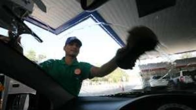 Customers are disappointed that pump attendants at some petrol stations are no longer allowed to wipe their windscreens
