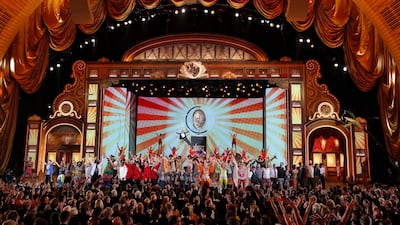 Host Neil Patrick Harris, hanging from a large replica of the Tony Award, performs during the opening number of the Tony Awards. Lucas Jackson / Reuters