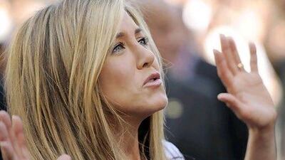 Jennifer Aniston's property dealings will allow her to absorb the loss of half a million dollars on the sale of two New York apartments. Chris Pizzello / AP Photo