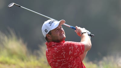 Zander Lombard of South Africa plays his second shot into the second green during the third round of the Ras Al Khaimah Championship at Al Hamra Golf Club on February 4, 2023. Getty