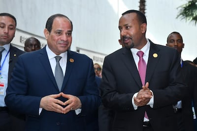 Egyptian President Abdel Fattah Al Sisi (left) and Prime Minister of Ethiopia Abiy Ahmed talk during the 32nd African Union Summit in Addis Ababa, Ethiopia, in 2019.