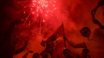 Pakistan Peoples Party supporters celebrate on the street after a Supreme Court ruling that the National Assembly should reconvene after it was dissolved by Prime Minister Imran Khan. AFP