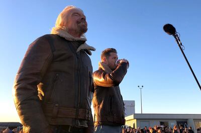 Richard Branson watches the take-off of Virgin Galactic’s aircraft carrying the Unity spaceship on December 13, 2018. Reuters