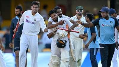 India batsman Rishabh Pant celebrates victory with his teammates after his unbeaten 89 helped India defeat Australia in the fourth Test at the Gabba, Brisbane, and win the series 2-1 on Tuesday, January 19. Getty