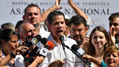 Venezuela's National Assembly president Juan Guaido speaks before a crowd of opposition supporters. AFP
