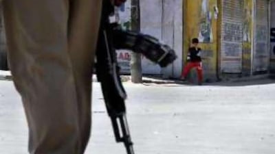 Indian paramilitary forces patrol the streets of Srinigar after a curfew was imposed this week.