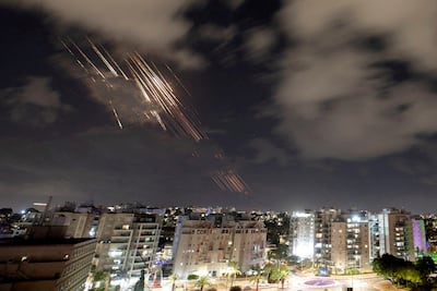 Israel's defence systems intercept rockets over Ashkelon after Iran had fired a salvo of ballistic missiles on October 1. Reuters