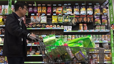 Consumption lending, such as credit card and auto loans, accounts for about 19 per cent of the total household debt in China. Andy Wong / AP