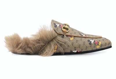 Women's GG Disney x Gucci Princetown slippers.