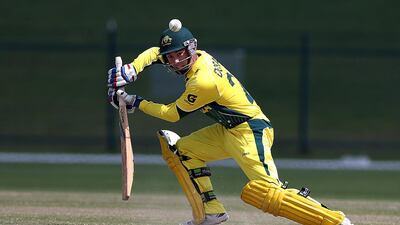 Jake Doran of Australia plays a shot during the ICC U19 Cricket World Cup 2014 match between Australia and Bangladesh at the Zayed Cricket Stadium in AbuDhabi on Wednesday. Satish Kumar / The National