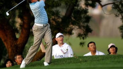 Ireland's Rory McIlroy plays a shot on the 3rd hole during the second day of the Dubai Desert Classic golf tournament on January 30, 2009. First round show stealer with a 64, the 19-year-old Irishman, completed just three holes before darkness fell and after a bogey at the first he was at seven-under par for the tournament in search of his first win since turning professional in 2007. AFP PHOTO/MARWAN NAAMANI *** Local Caption *** 208815-01-08.jpg