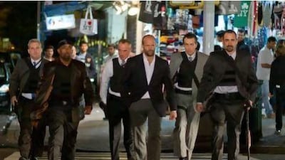 From left, James Colby, Barry Bradford, Robert John Burke, Jason Statham, Matt O'Toole and Jay Giannone in Safe.