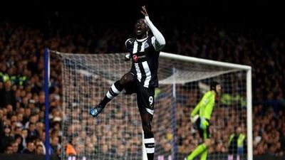 Papiss Cisse of Newcastle celebrates after scoring the opening goal against Chelsea at Stamford Bridge last night.