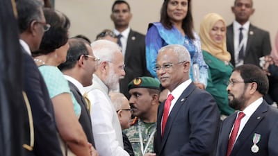 Indian Prime Minister Narendra Modi, center left, congratulates Maldives' new President Ibrahim Mohamed Solih after his swearing-in ceremony in Male, Maldives. AP