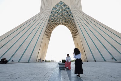 Iranian women take a photo in front of Azadi Square in Tehran, Iran, June 11, 2026. Majid Asgaripour/WANA (West Asia News Agency) via REUTERS ATTENTION EDITORS - THIS PICTURE WAS PROVIDED BY A THIRD PARTY. ISRAEL OUT. NO COMMERCIAL OR EDITORIAL SALES IN ISRAEL. NO ACCESS FOR ISRAELI MEDIA. NO USE BBC PERSIAN. NO USE VOA PERSIAN. NO USE MANOTO. NO USE IRAN INTERNATIONAL. NO USE RADIO FARDA. DIGITAL: NO USE BBC PERSIAN. NO USE VOA PERSIAN. NO USE MANOTO. NO USE IRAN INTERNATIONAL. NO USE RADIO FARDA.