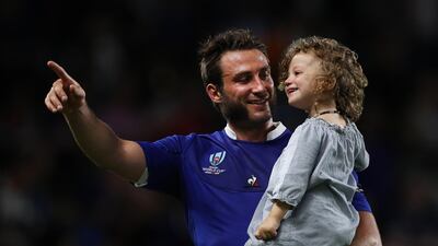 Maxime Medard of France and his daughter celebrate their victory after the Rugby World Cup 2019 Group C game between France and USA at Fukuoka Hakatanomori Stadium in Fukuoka, Japan. Getty Images