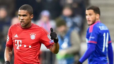 Bayern Munich's Douglas Costa celebrates after scoring the opening goal against Olympiakos on Tuesday night in the Champions League. Peter Kneffel / EPA / November 24, 2015