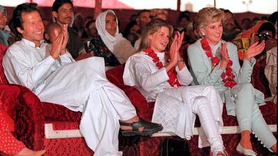 Imran and Jemima Khan sit with Diana, Princess of Wales, during her visit to the former Pakistani cricket captain's hospital in Lahore in April 1996. WireImage