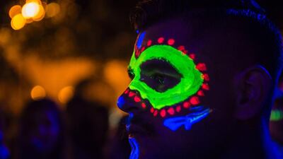 A man attends a festival marking the 475th anniversary of the founding of Guadalajara in Mexico. Hector Guerrero / AFP Photo