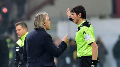 Roberto Mancini gets a red card from referee Antonio Damato during the match between AC Milan and Inter Milan. Giuseppe Cacace / AFP