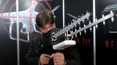 Michael Rudolph, head of airspace safety at Dubai Civil Aviation Authority, pictured with an anti-drone device. Chris Whiteoak / The National