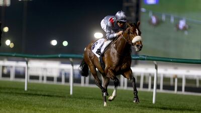 Mshawish riden Richard Hughes trained by M Delzangles wins the 5th race at Meydan in Dubai February 27, 2014. (Sammy Dallal / The National)
