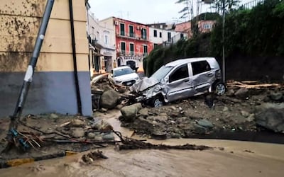 Cars swept up in a landslide in Casamicciola, Italy following heavy rains. Ansa / AFP