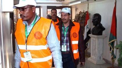 Arab League observers in a government building during their visit to Deraa on Thursday. Observers were in Harasta and Douma, areas on the outskirts of northern Damascus on Friday.
